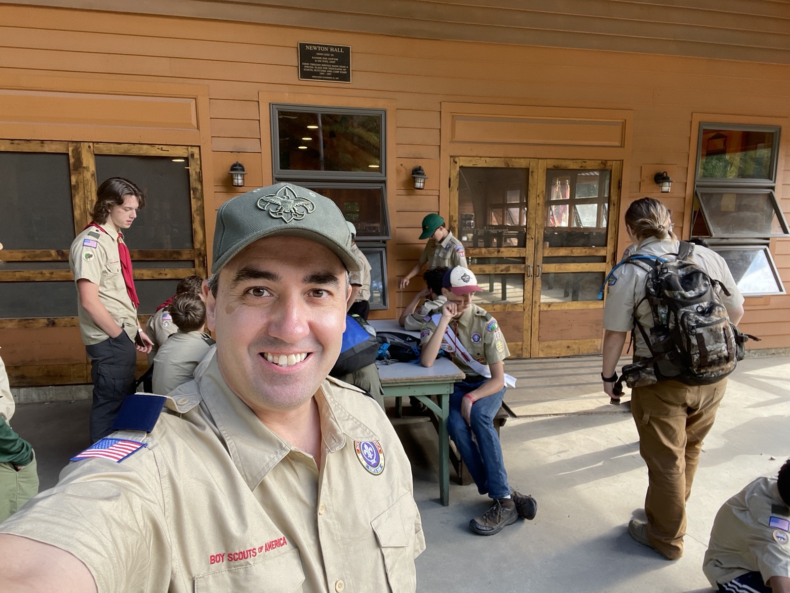 Adult leaders at a council summer camp dining hall.